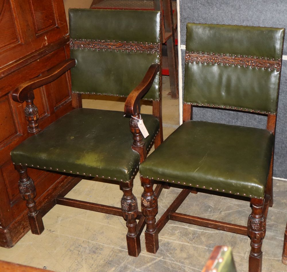 A set of six 1920s Jacobean revival carved oak dining chairs (two with arms)